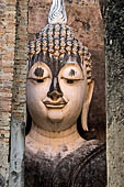 Thailand - Old Sukhothai - Wat Si Chum. Detail od the the impressive 15 meter high seated Buddha named Phra Achana.  